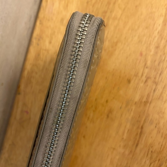 Coach Debossed Signature Cream Leather Wallet - Picture 9 of 9